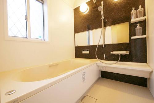 Koupelna v ubytování アンドステイ高砂2丁目