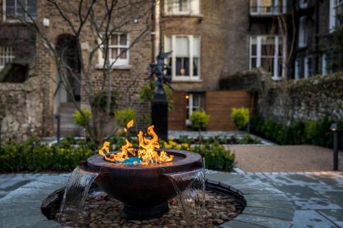 a fire fountain in front of a building at Number 31 in Dublin