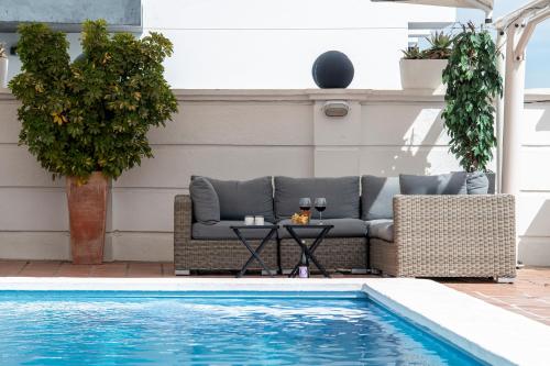 Πισίνα στο ή κοντά στο Hotel B&B Casa Arena Sevilla