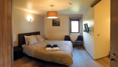 Postel nebo postele na pokoji v ubytování B&B Meulecauter