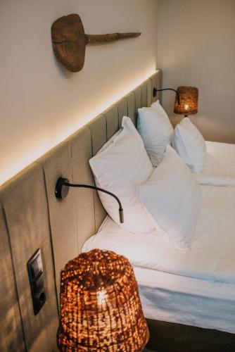 Letto o letti in una camera di Balvanyos Resort - Peakture Hotel & Grand Hotel Balvanyos