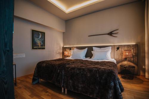 Letto o letti in una camera di Balvanyos Resort - Peakture Hotel & Grand Hotel Balvanyos
