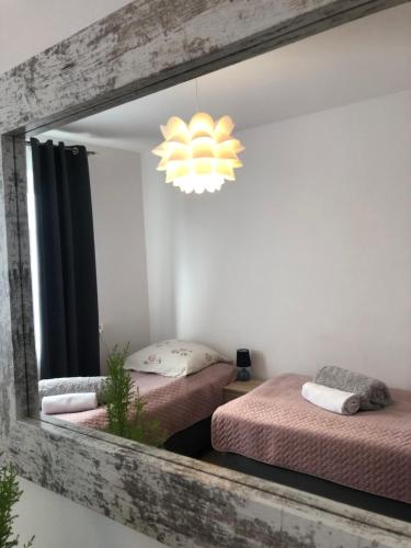 Ένα ή περισσότερα κρεβάτια σε δωμάτιο στο Apartament u Gogoca