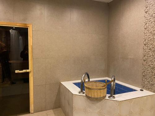 Ένα μπάνιο στο Гостевые дома в Цветах Башкирии
