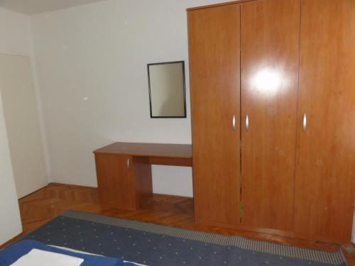 Ein Bett oder Betten in einem Zimmer der Unterkunft Apartmani Anka
