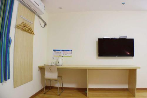 Μια τηλεόραση ή/και κέντρο ψυχαγωγίας στο 7Days Inn Shaoguan Renhua Mount Danxia
