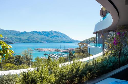 a view of the water from a house at Boutique Hotel Vissi d'Arte in Budva