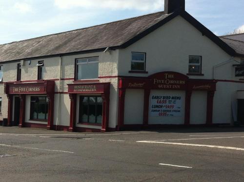 a building on the side of a street at 5 Corners Guest Inn in Ballyclare