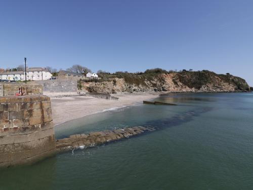 a view of a beach next to the ocean at Oh Buoy! in Charlestown