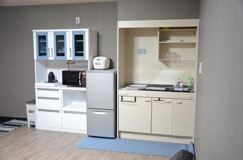 Uri Houseにあるキッチンまたは簡易キッチン