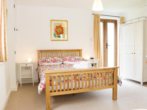 Posteľ alebo postele v izbe v ubytovaní Acorn Cottage 1