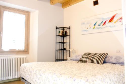 Postel nebo postele na pokoji v ubytování LA MAGNOLIA Guests House