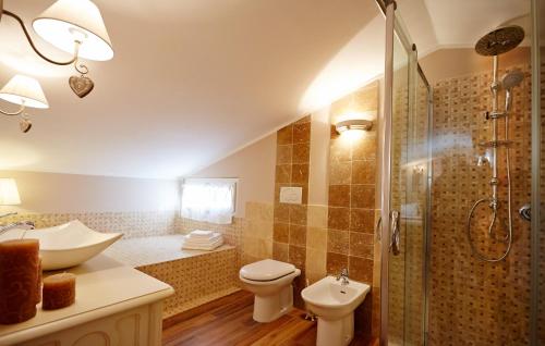 a bathroom with a sink toilet and a shower at Holiday home with exclusive swimming pool in the Tuscan Maremma in Montemassi