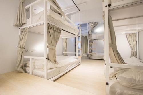 Krevet ili kreveti na sprat u jedinici u okviru objekta Light Inn