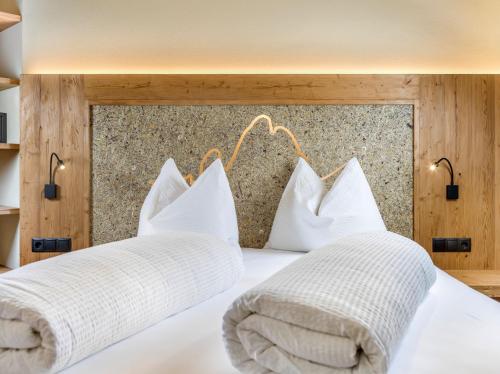 Ein Bett oder Betten in einem Zimmer der Unterkunft Apartments Riega