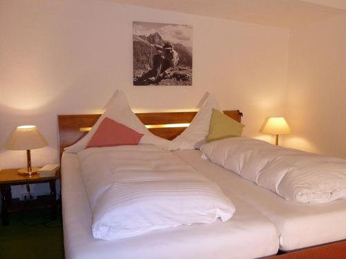 Posteľ alebo postele v izbe v ubytovaní Ferienhaus Geiger
