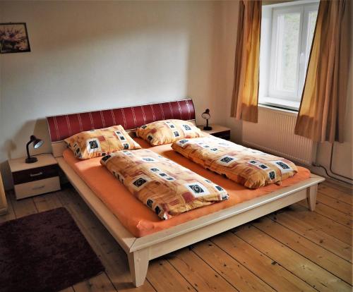 Säng eller sängar i ett rum på Apartmán Adam