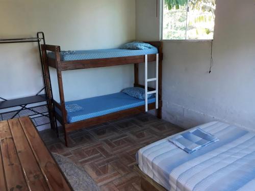 Katil dua tingkat atau katil-katil dua tingkat dalam bilik di Magic Island Casas