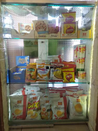 a refrigerator filled with lots of food at Affittacamere da chris in Reggio Calabria