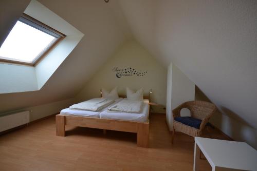 Postel nebo postele na pokoji v ubytování Haus Sir Henry