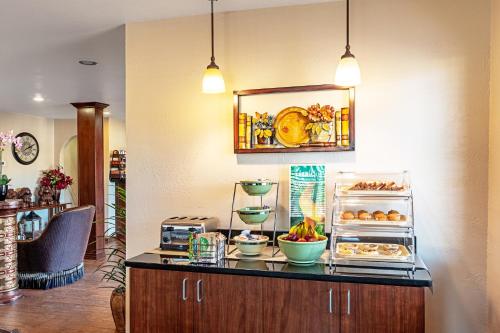 a kitchen with a counter with food on it at Quality Inn Three Rivers in Three Rivers