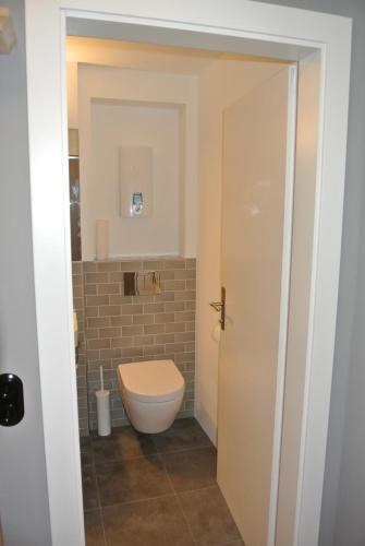 Ένα μπάνιο στο Haus Wiesberger Apartment TOP25 Südseite