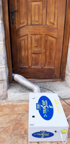a pizza box sitting in front of a door at Casa Rural Lagun Etxea in Pobes