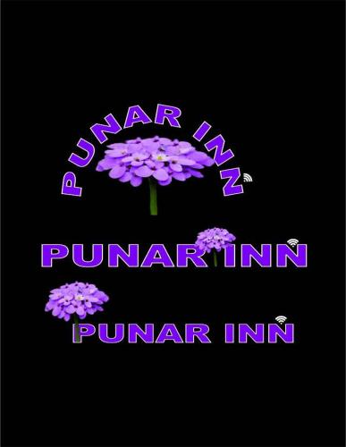 a purple sign with a bunch of purple flowers at Punar Inn Hotel in Skardu