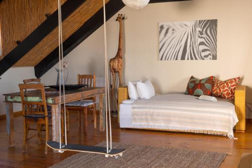Cama o camas de una habitación en Sundowner Loft