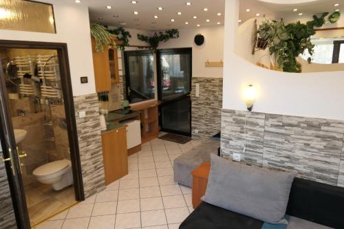 a bathroom with a shower and a toilet at Apartamenty u Łukasza in Zakopane