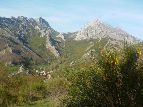 a mountain range with a village in a valley at La Hospedería de Salamón in Salamón