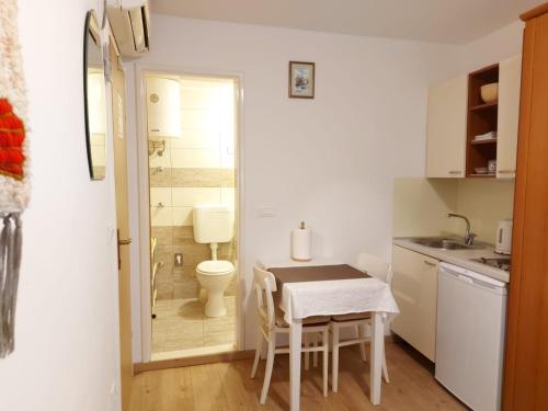 Kuchyň nebo kuchyňský kout v ubytování Guest House Korunić