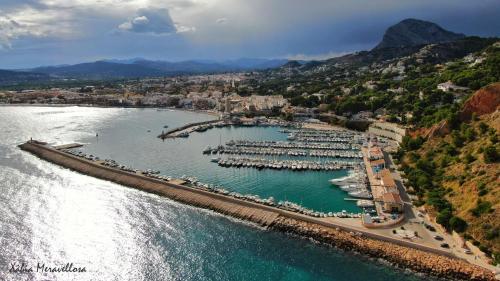 an aerial view of a harbor with boats in the water at Jávea Apartment Mar in Jávea