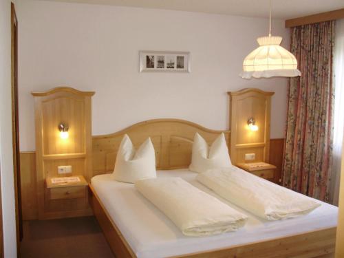 Posteľ alebo postele v izbe v ubytovaní Haus Elisabeth