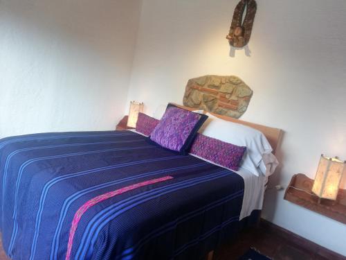 Postel nebo postele na pokoji v ubytování Yellow House Hostel B&B