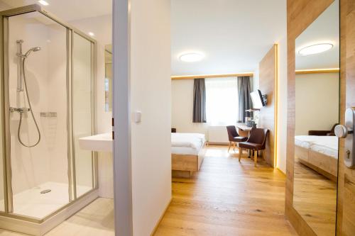 Postel nebo postele na pokoji v ubytování Hotel Stich