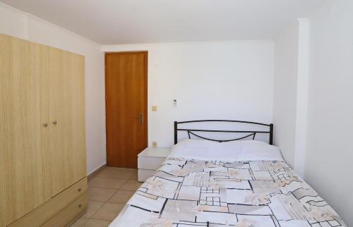 Postel nebo postele na pokoji v ubytování Katerina Apartments