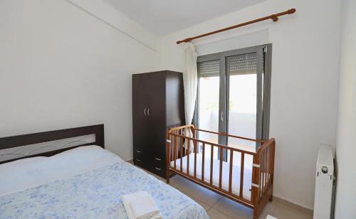 Postel nebo postele na pokoji v ubytování Katerina Apartments