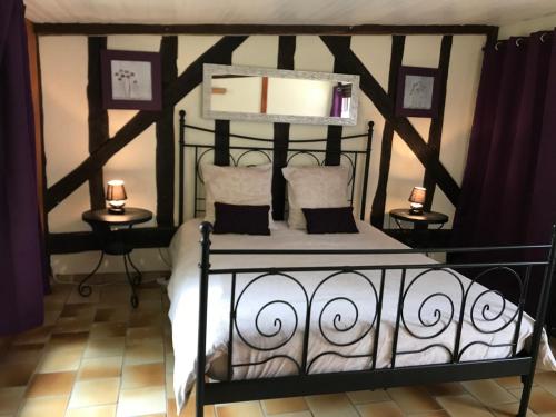 Postel nebo postele na pokoji v ubytování Gîtes Chambres d'hôtes Entre Terre & Mer