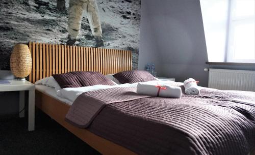 Katil atau katil-katil dalam bilik di Explorer B&B Old Town Rooms & Apartment #don't be a tourist, be an Explorer!