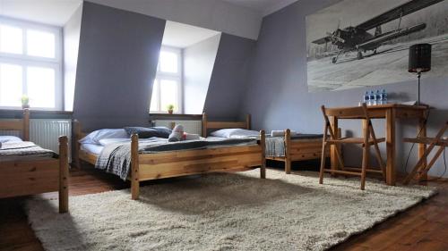 Katil atau katil-katil dalam bilik di Explorer B&B Old Town Rooms & Apartment #don't be a tourist, be an Explorer!