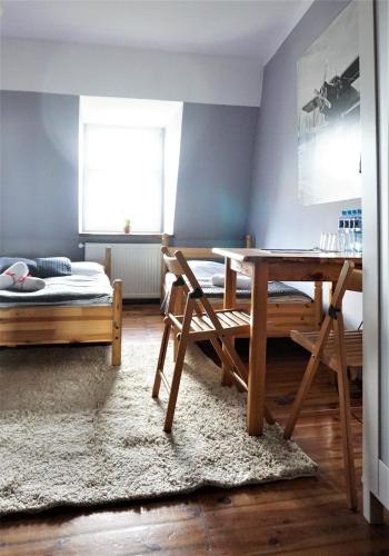 Katil atau katil-katil dalam bilik di Explorer B&B Old Town Rooms & Apartment #don't be a tourist, be an Explorer!
