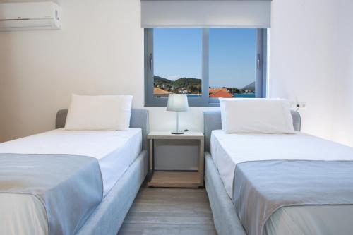 Katil atau katil-katil dalam bilik di KN Ionian Suites