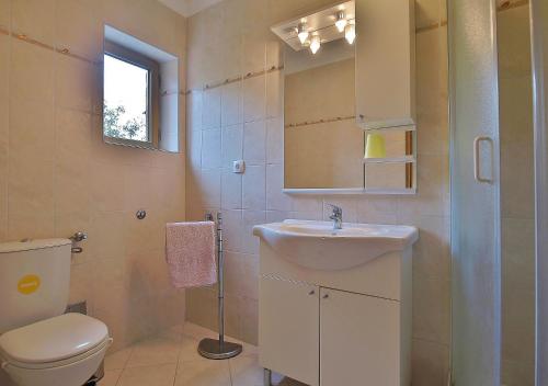 Koupelna v ubytování Apartments Biserka