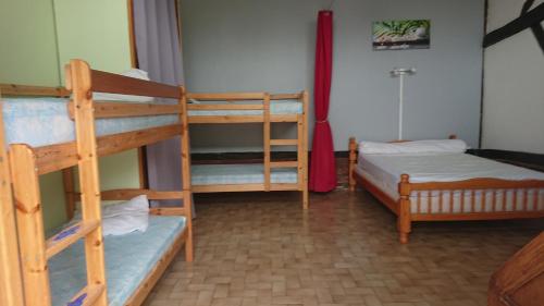 
Un ou plusieurs lits superposés dans un hébergement de l'établissement Gîte aux écuries du mesnil david
