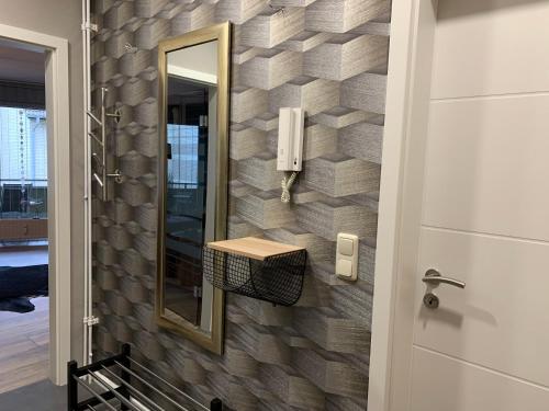 Kylpyhuone majoituspaikassa Apartment Enjoy