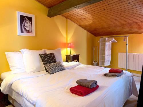 En eller flere senge i et værelse på Bordeaux Terrace