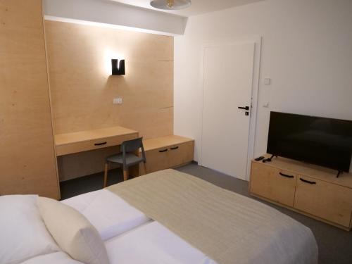 Postel nebo postele na pokoji v ubytování Beskid Ski Villa