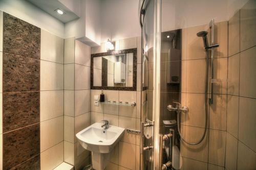 Kúpeľňa v ubytovaní Apartament Central