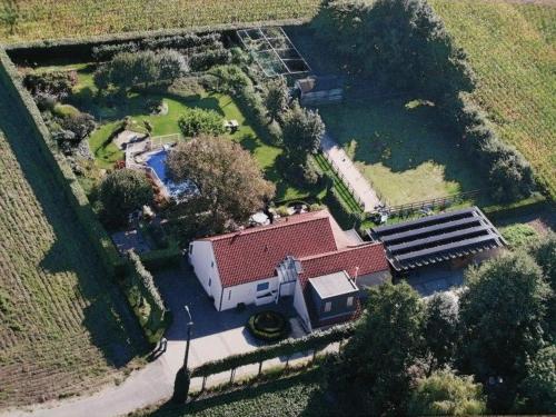 an aerial view of a house with a yard at tende in Deerlijk